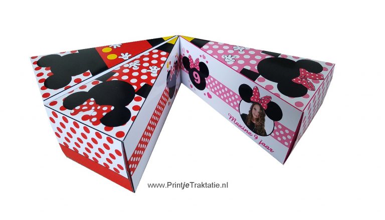 Taartpunten van Mickey en Minnie Mouse met rode stippen